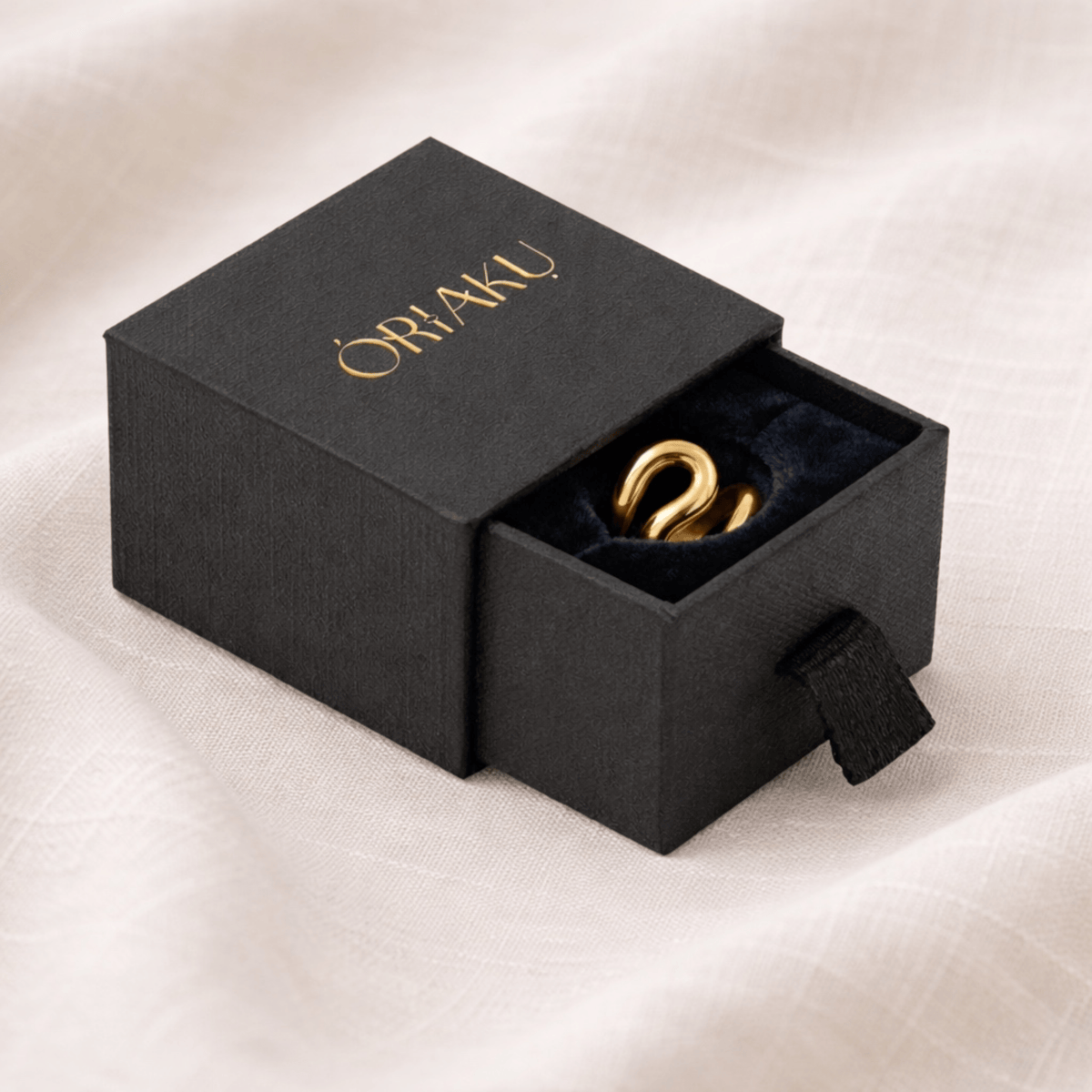 Gold-plated brass curved statement ring handcrafted