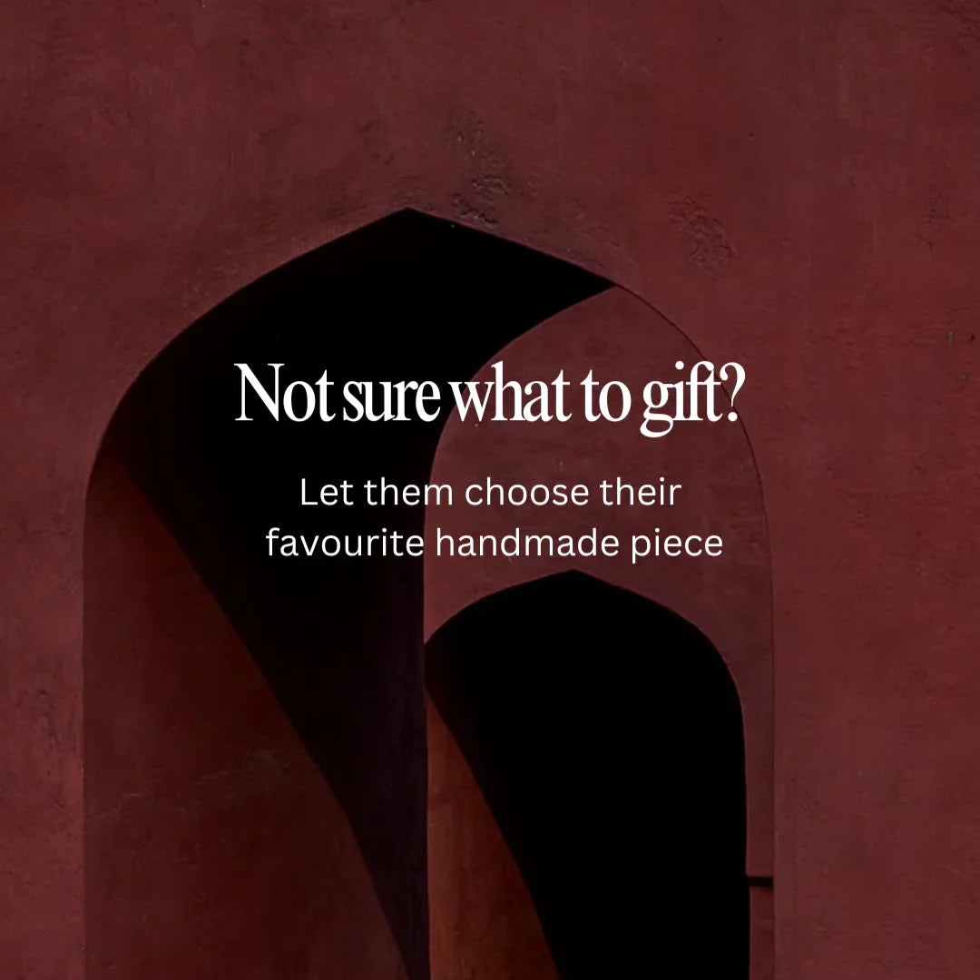 Red archway with text overlay 'Not sure what to gift? Let them choose their favourite handmade piece'.